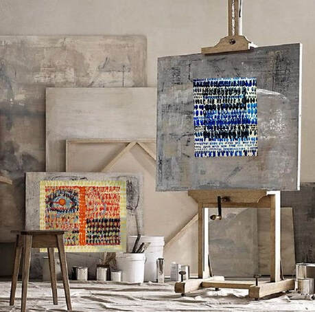 Artist's studio with abstract paintings on easels. 