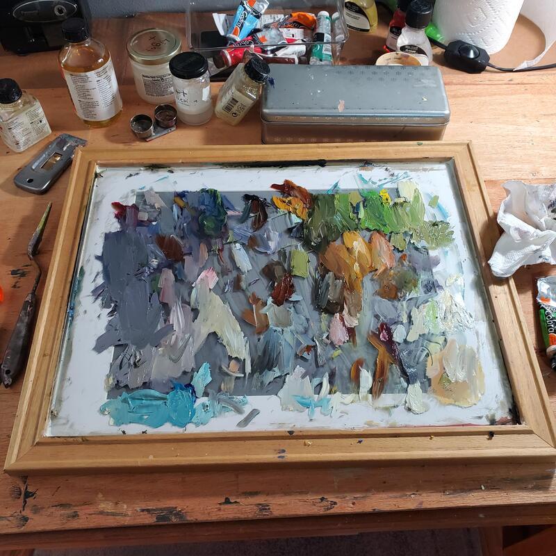 photo of a painting palette with paint on it.  